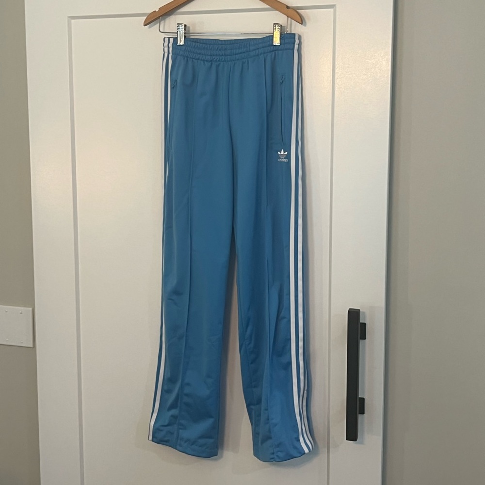 Blue Adidas track pants